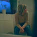 A voyeuristic video clip in which a blonde girl with short hair pees and wipes herself. She does not appear to be aware of the filming. No audio.